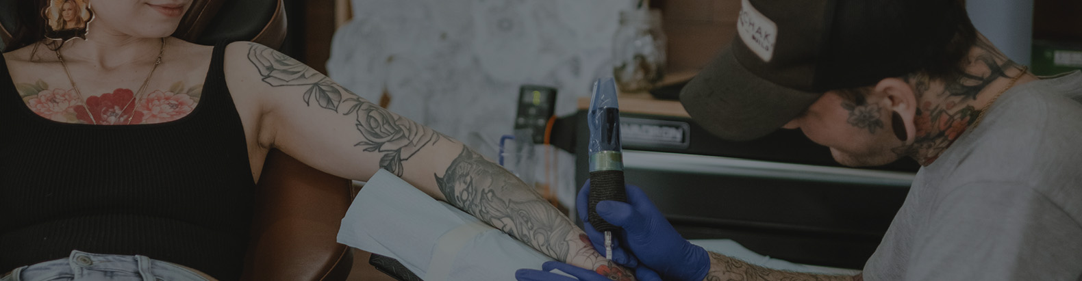 woman getting tattood
